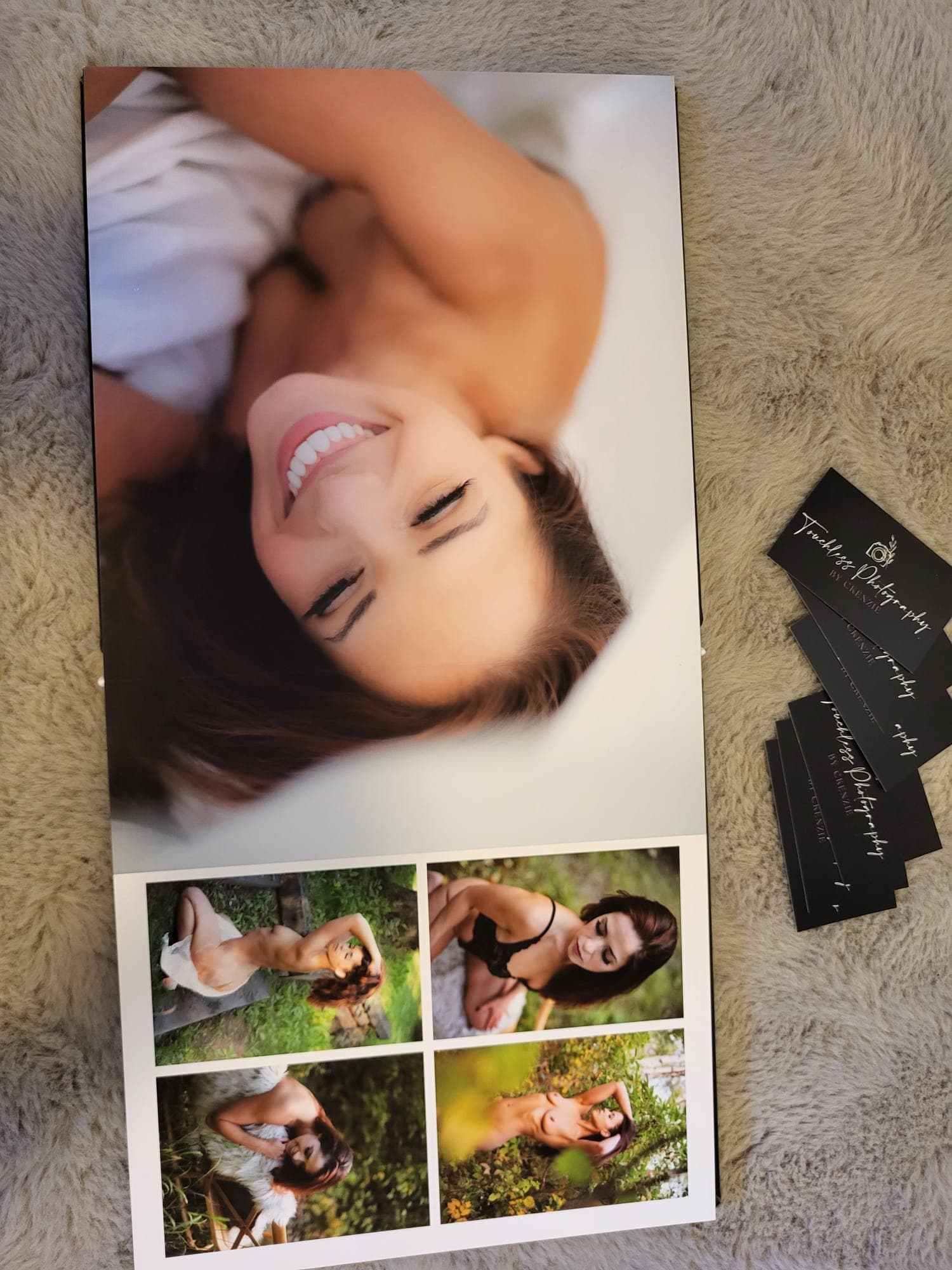 An open album spread with a smiling portrait and four smaller frames